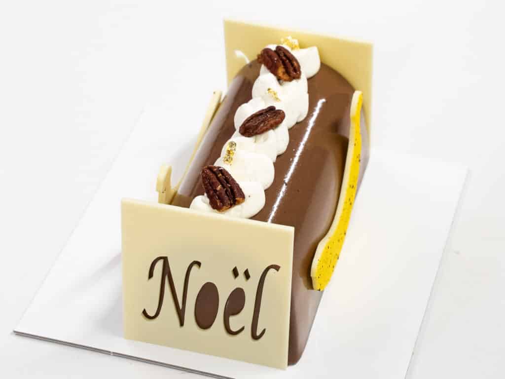 bûche pâtissière banane chocolat pécan La Fruitière du Val Evel